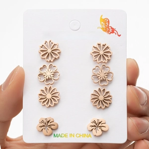 Rose gold stainless steel stud earring set with four pairs of delicate floral designs
