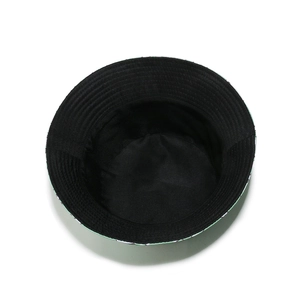 Detailed interior of frog bucket hat showing black fabric lining and reinforced stitching