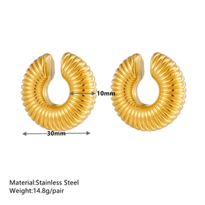 Golden stainless steel chunky twisted hoop earrings with 30mm diameter for women