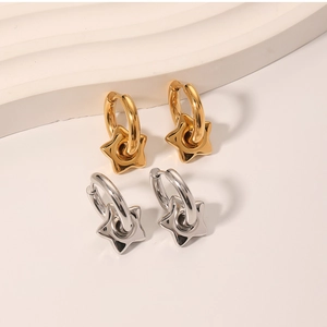 Detailed view of 18k gold and silver stainless steel star dangle earrings set