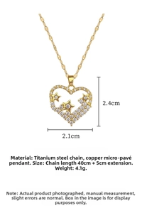 Detail view of heart and star pendant with precise measurements in gold titanium steel