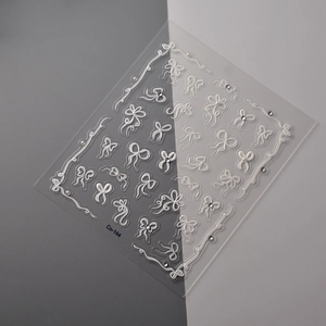 3D embossed white ribbon bow nail art stickers with pearls and crystal rhinestones