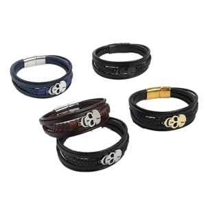 Multilayer braided leather bracelets with skull charms and stainless steel magnetic clasps