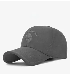 Detail of grey cotton baseball cap with eagle embroidery and curved visor design