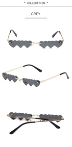 Detailed views of heart-shaped sunglasses with grey lenses and gold metal frames