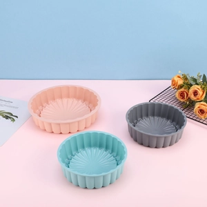 Three-piece set of round silicone cake molds with flower petal texture in three colors