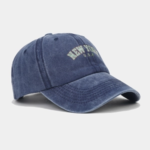 Detail of New York embroidery on washed cotton fabric of the vintage baseball cap