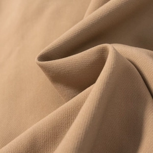 Vue macro détaillée de la texture du tissu en coton kaki avec des motifs de tissage