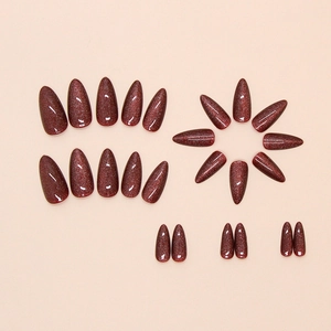 Dark red cat eye stiletto press-on nails with 24 pieces in a shimmering glossy finish