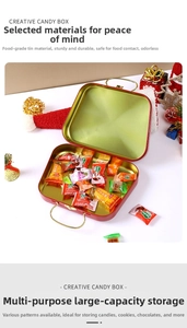 Close-up of food-grade metal Christmas candy box with a spacious golden interior