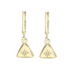 Detail of gold geometric hoop earrings featuring triangle charms and sparkling zircons