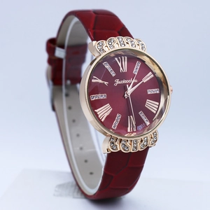 Women's quartz watch with red dial, roman numerals and gold case at 45-degree angle