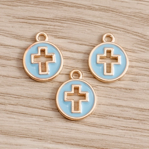 Golden round pendant with hollow cross design and light blue enamel for DIY jewelry