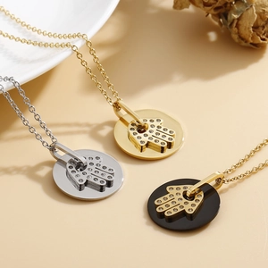 Minimalist Hamsa hand necklaces with rhinestones in gold, silver, and black finish