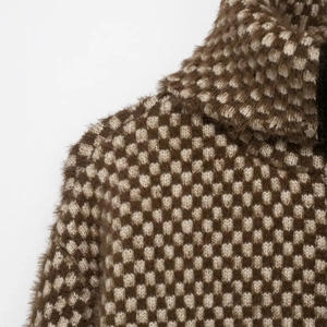 Brown mixed tweed knit sweater with turtleneck design and high-quality plush texture