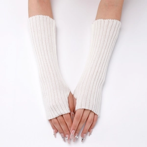 Detail of cream white ribbed knit arm warmers showing texture and fingerless design