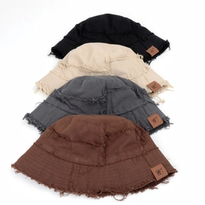 Frayed edge fisherman bucket hats in four colors with patch detail for women