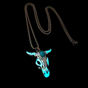 Luminous bull skull pendant necklace with turquoise stone glowing in the dark