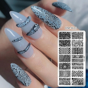 Macro detail of OM-H10 nail plate showing animal skin textures on long pointed nails