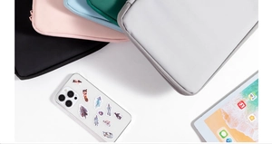 Flat lay of colorful waterproof PU leather laptop sleeves in five different colors