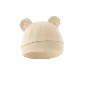 Detailed view of beige cotton knit baby hat featuring cute bear ears and fine stitching