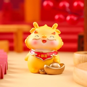 Detail of cute Tang dynasty cartoon girl keychain holding gold ingot with blessing