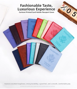 Macro view of assorted PU leather passport holders with gold foil US emblem and texture