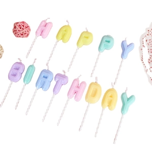 Colorful Happy Birthday letter candles in macaron colors for cake decoration