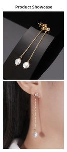 Detail of S925 silver long tassel earrings with baroque pearls and sparkling cubic zirconia