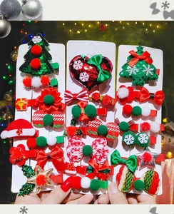 Ensemble détaillé de pinces à cheveux de Noël avec paillettes, nœuds et étoiles