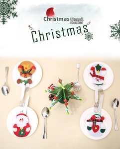 Detailansicht der Besteckhalter aus Filz mit Weihnachtsmann und Schneemann Motiven