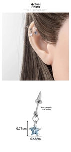 Detail of spike cartilage piercing with blue star pendant and 0.8x6mm bar size