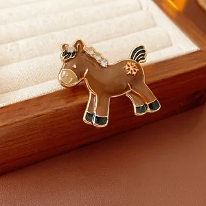 Exquisite horse brooch with brown enamel, gold snowflake detail and rhinestones
