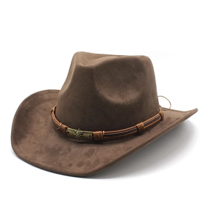 Classic dark brown suede western cowboy hat with curved brim and vintage skull emblem
