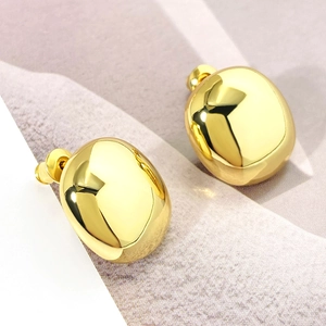Chic gold C-shaped metal stud earrings with a polished pebble design in minimalist style