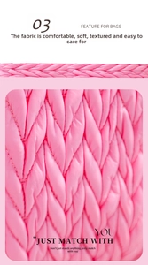 Close-up of pink quilted puffer fabric with a soft heart-shaped textured wave pattern