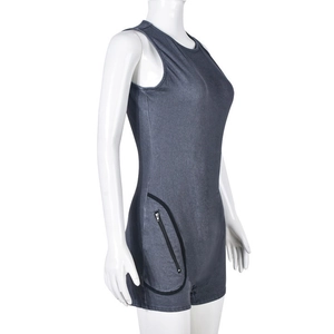 Close-up of sleeveless grey denim jumpsuit featuring functional side zipper pocket