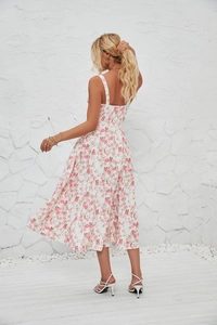 Detail view of the floral print sleeveless midi dress with thin straps and side slit design