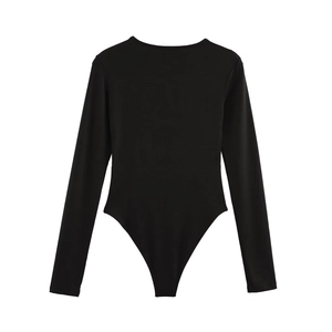 Flat lay of a black long sleeve bodysuit featuring a round neck and slim fit design
