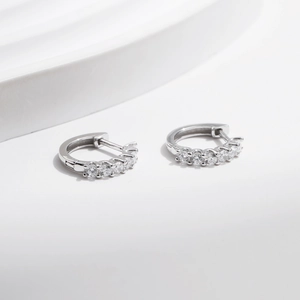 Minimalist S925 sterling silver huggie earrings with brilliant pavé moissanite stones