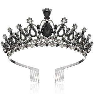 Detail of gothic bridal crown with large pear-cut black gemstone and claw-set rhinestones