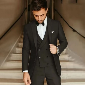 Slim fit black three-piece tuxedo suit with double-breasted vest for business and parties