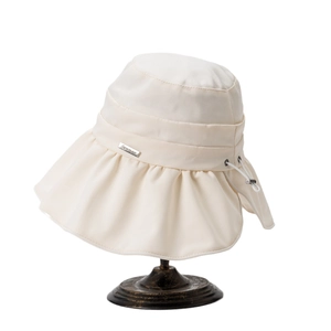 Women's beige wide-brim sun hat with elegant ruffled edges and adjustable drawstring