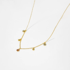 Gold chain necklace with five multi-colored zirconia flowers and light blue gemstones