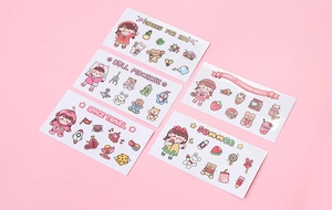 Flat lay of five sheets of cute waterproof cartoon stickers for water bottles and journals