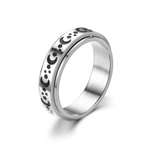 Rotating stainless steel spinner ring with engraved moon and stars in silver finish