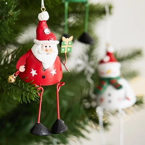 Festive iron Santa and snowman hanging ornaments with bells and dangling metal legs