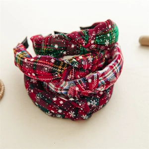 Set of four Christmas knot headbands featuring red and green plaid with snowflake patterns