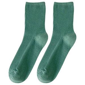 Dark green Japanese style slouch socks with vertical ribbed knit texture for women