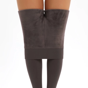 Close-up of thick grey velvet lining and wide ribbed waistband on thermal leggings